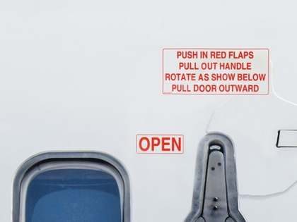 Door operating placard